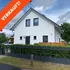 Modernes Einfamilienhaus mit verkauft-Schild in Eggersdorf