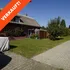 Klassisches Einfamilienhaus mit verkauft-Schild in Rüdersdorf