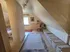 Moderne Küche mit funktionaler Ausstattung und direktem Zugang zur Terrasse.